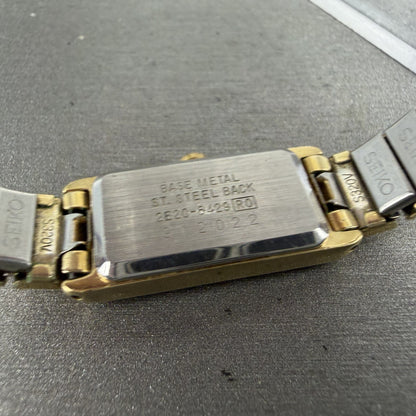 Seiko Tank Watch Women 12mm Black Dial Gold Tone Rectangle 2E20-6429 New Battery9