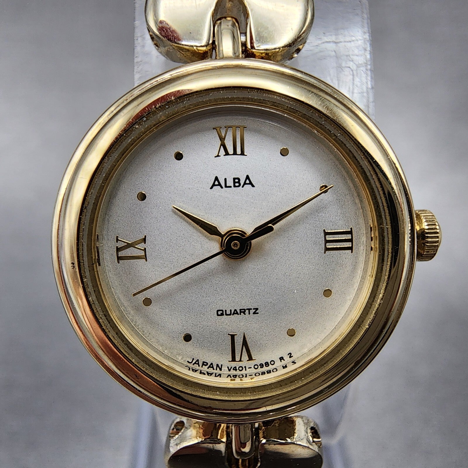 Alba Watch Women 20mm Champagne Dial Gold Tone Round Bangle V401019A New Batt1