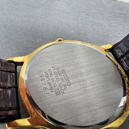 Seiko Watch Men 34mm Black Dial Gold Tone Round V7008A10 Leather PARTS10