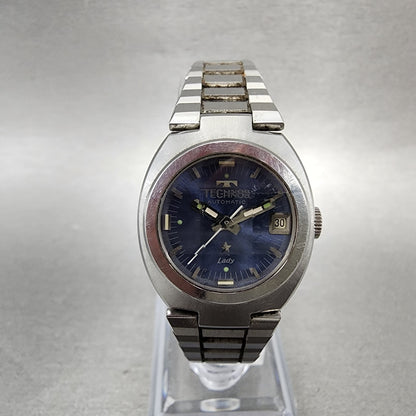 Technos Star Watch Women 24mm Blue Dial Silver Tone Date Automatic Runs VTG0