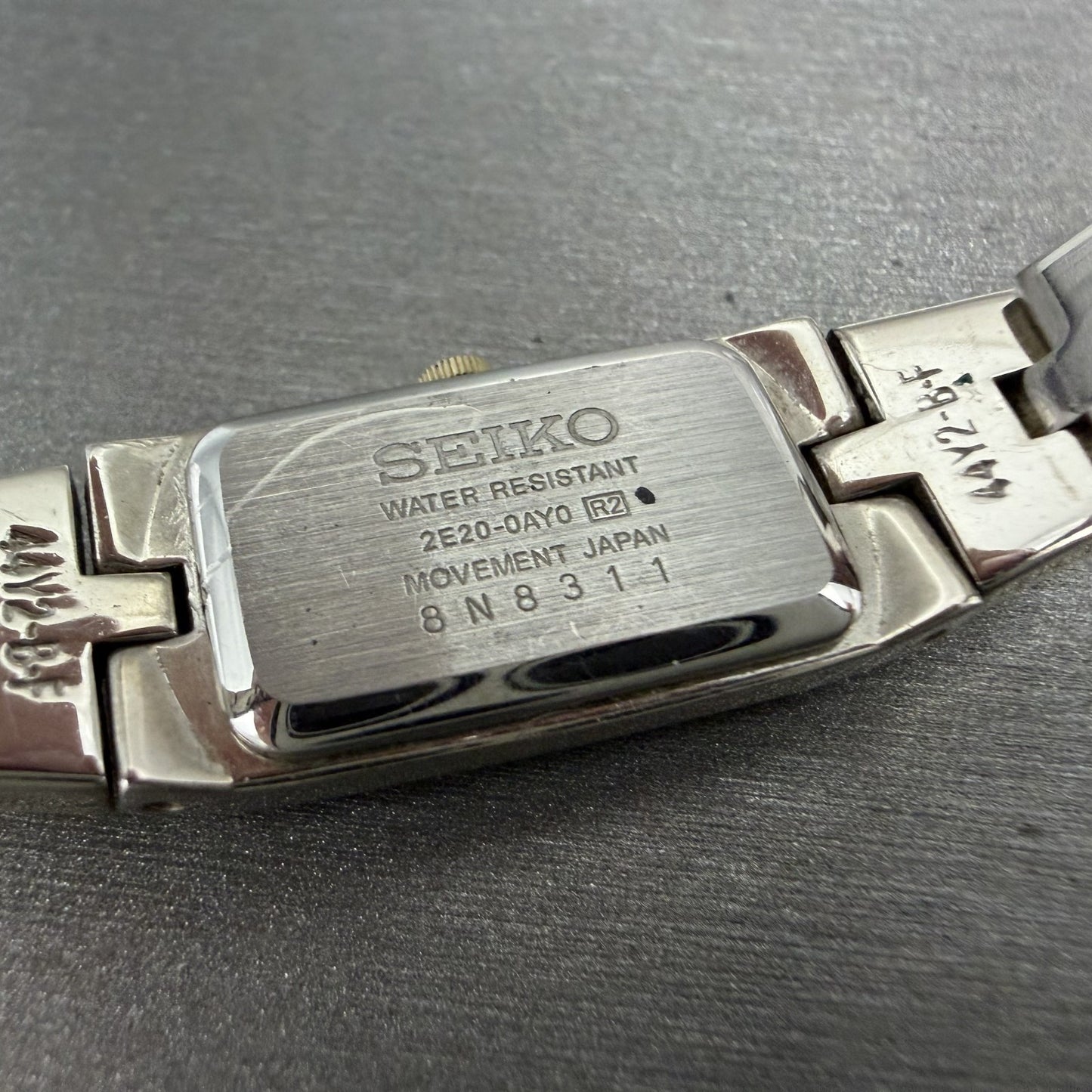 Seiko Tank Watch Women 13mm Black Dial Two Tone Rectangle 2E20-0AY0 New Batt II69