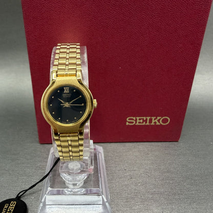 Seiko Watch Women  19mm Black Dial Gold Tone Round V4010099 New Batt NOS W/Box0