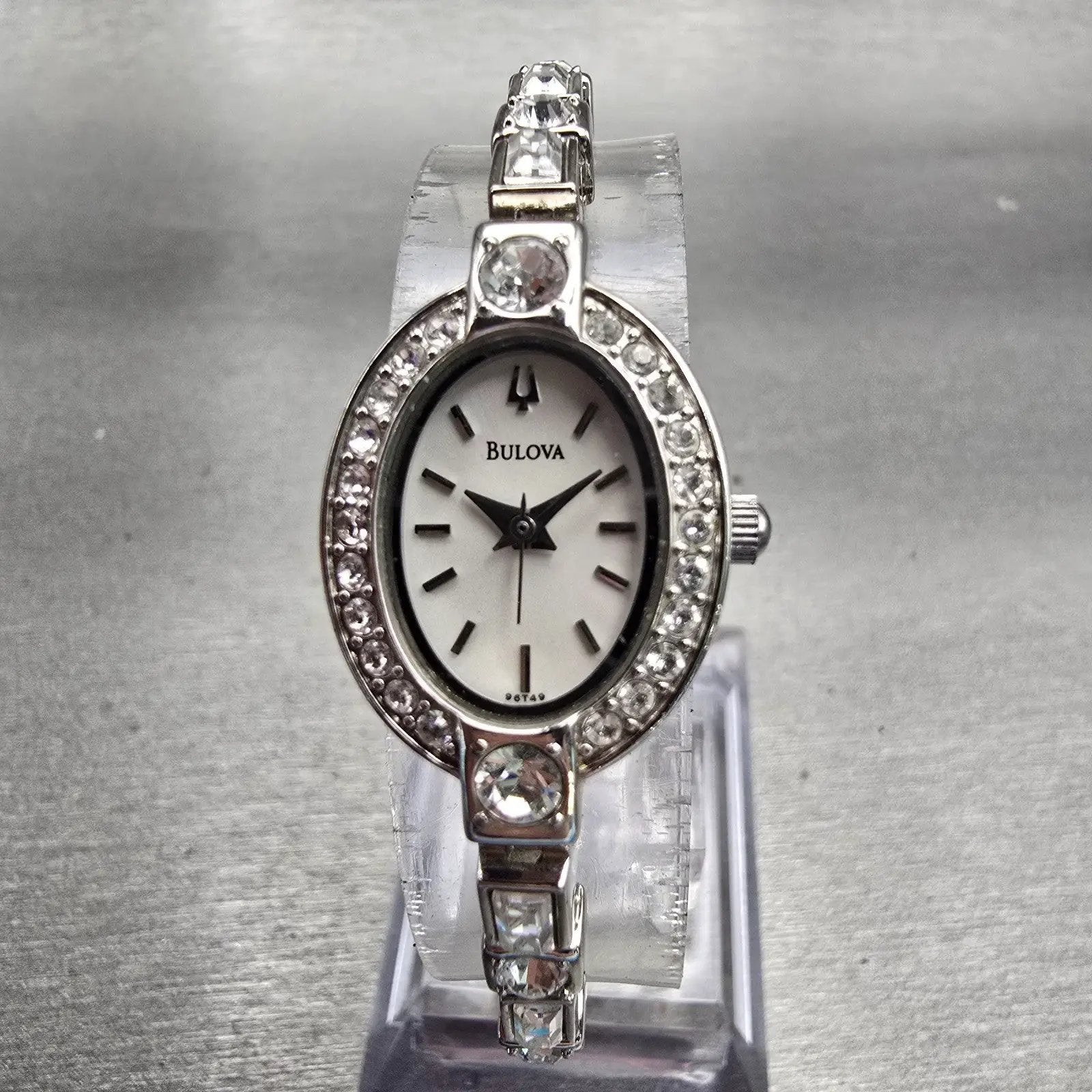 Bulova Watch Women 17mm Silver Dial Silver Tone Gemmed Oval 96T49 New Battery0