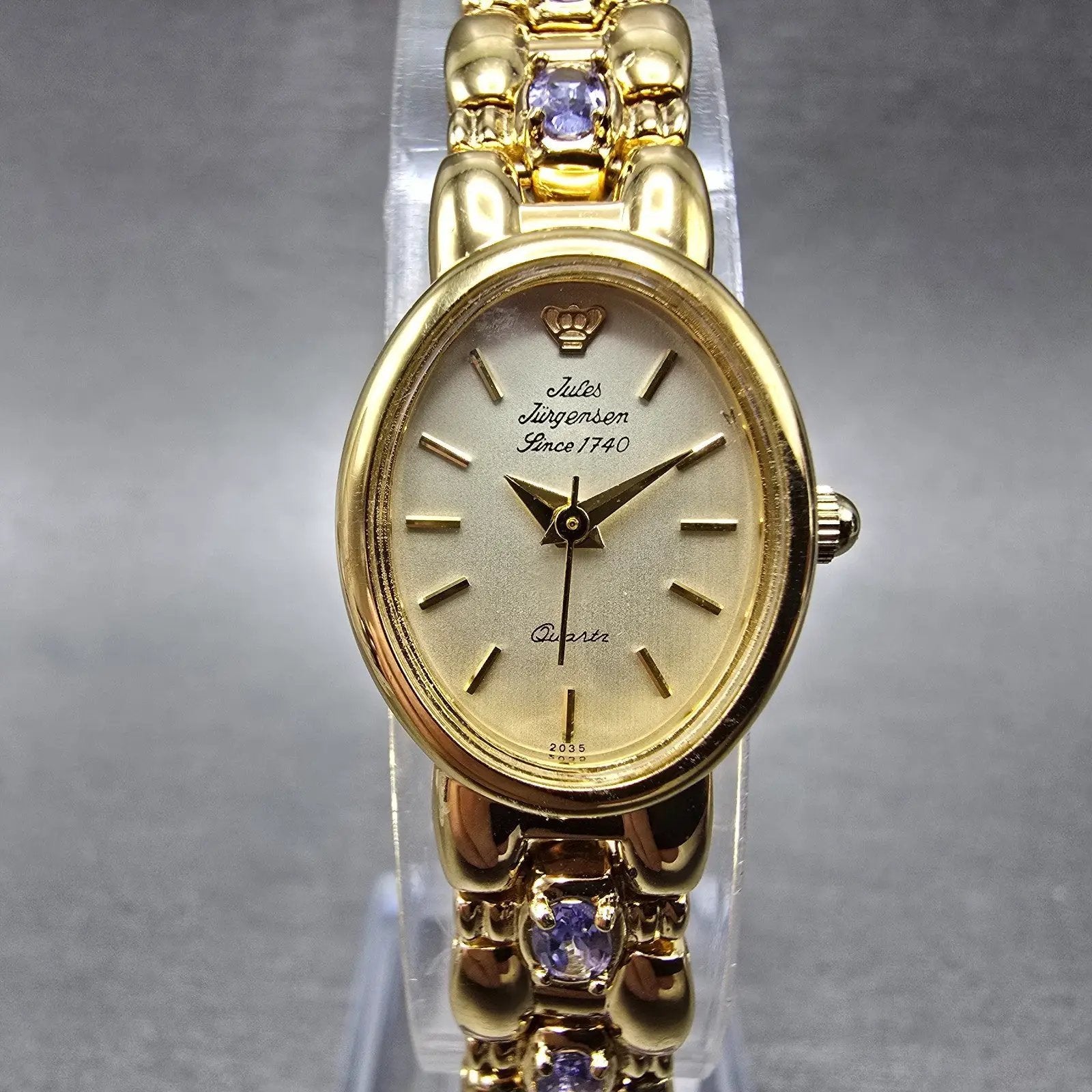 Jules Jurgensen Watch Women 17mm Champagne Dial Gold Oval Blue Gems New BatteryP0