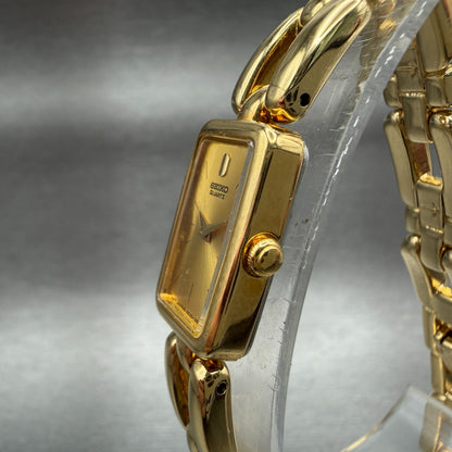 Seiko Tank Watch Women 13mm Champagne Dial Gold Tone Rectangle 2E207108 New Bat2
