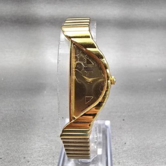Seiko Watch Women 15mm Gold Dial Gold Tone Asymmetrical 1F20-5D59 New Battery0