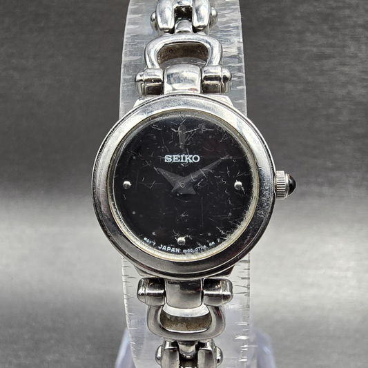 Seiko Watch Women 19mm Black Dial Silver Tone Round 1N00-0LK0 New Battery0