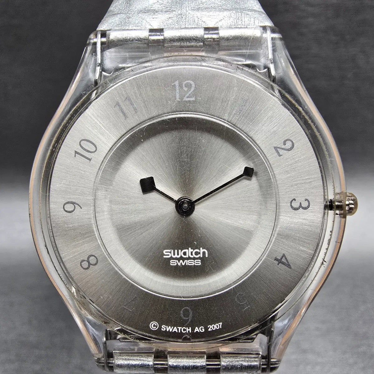 Swatch Skin Facet Glam Watch Women 34mm Silver Dial Clear Case SFK312 New Batt3