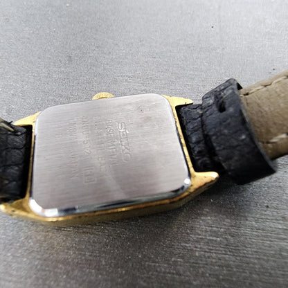 Seiko Tank Watch Women 17mm Silver Dial Gold Tone Rectangle 4N005121 New Batt9