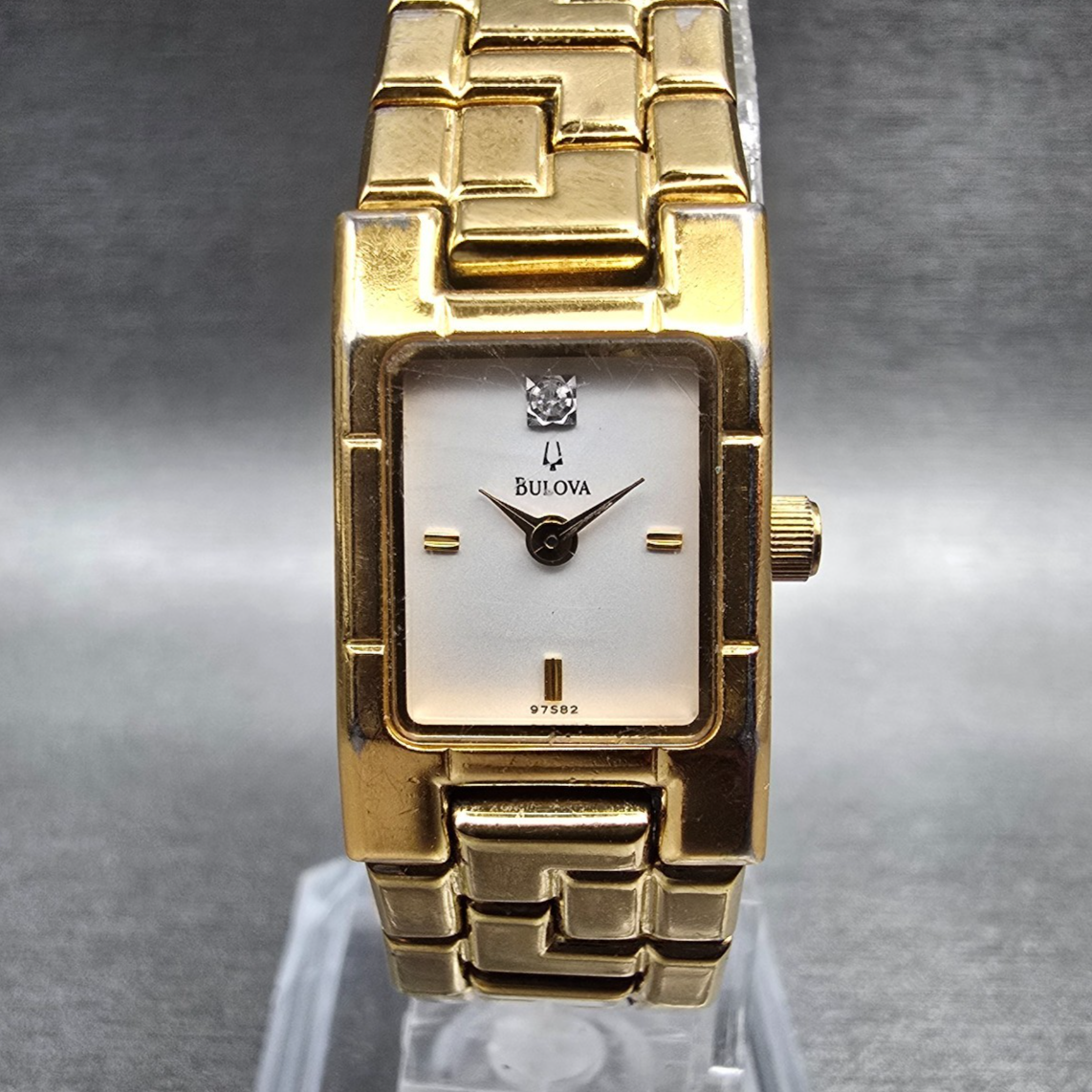 Bulova Watch Women 15mm White Dial Gold Tone Rectangle 97S82 New Battery0