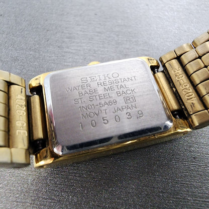 Seiko Tank Watch Women 16mm Black Dial Gold Tone Rectangle 1N015A69 New Battery9