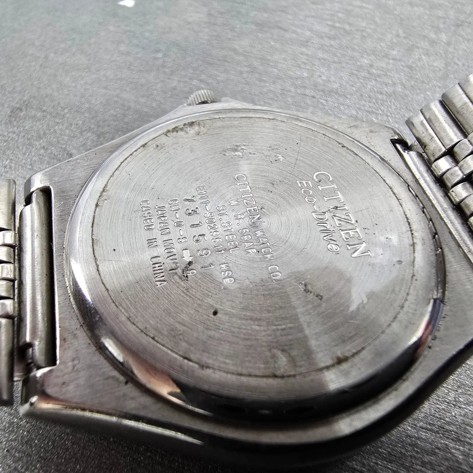 Citizen Eco-Drive Watch Men 38mm Black Dial Silver Tone Date E111-S029511 Runs9