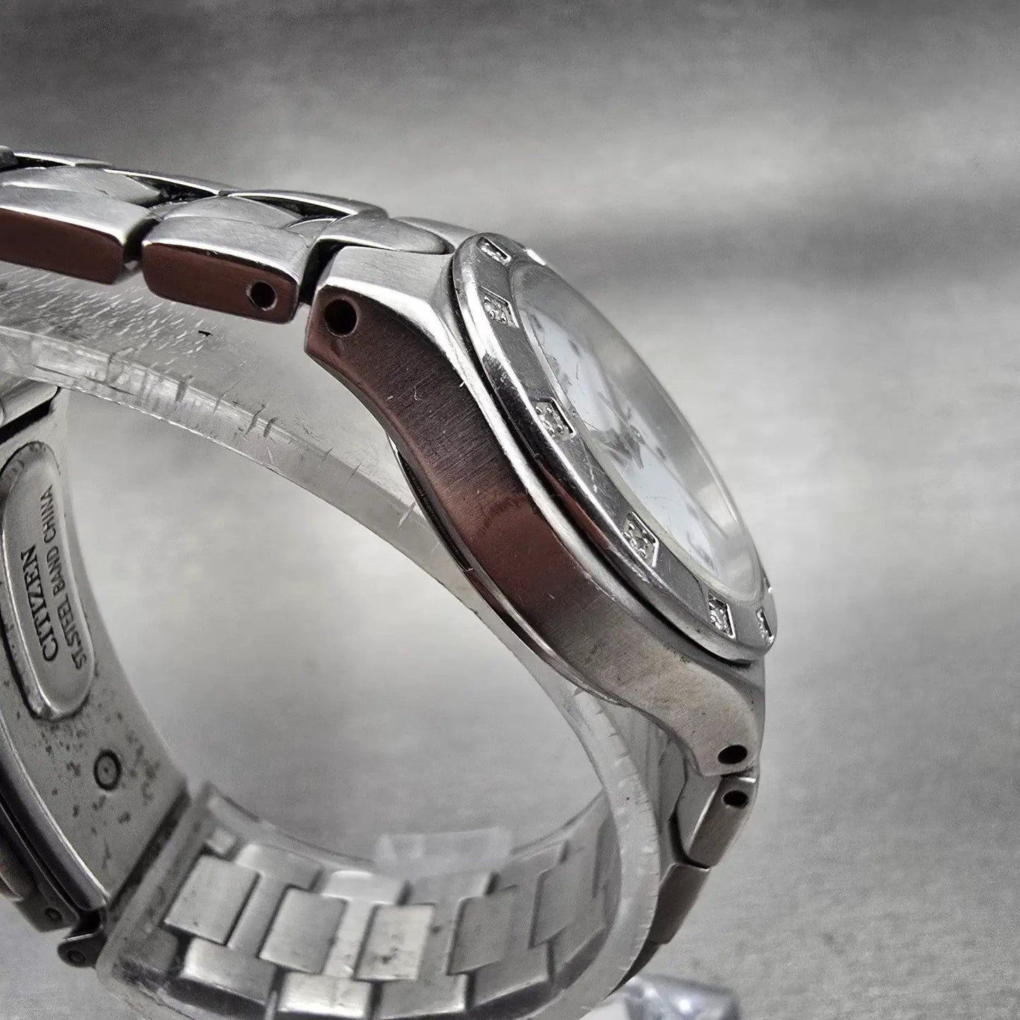 Citizen Eco-Drive Watch Women 25mm White Dial Silver Tone Date E011-S033705 Runs3