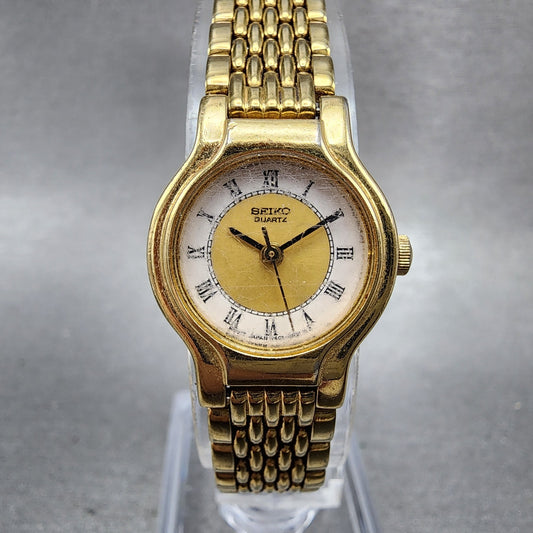 Seiko Watch Women 19mm White Dial Gold Tone Round V4010289 New Battery0