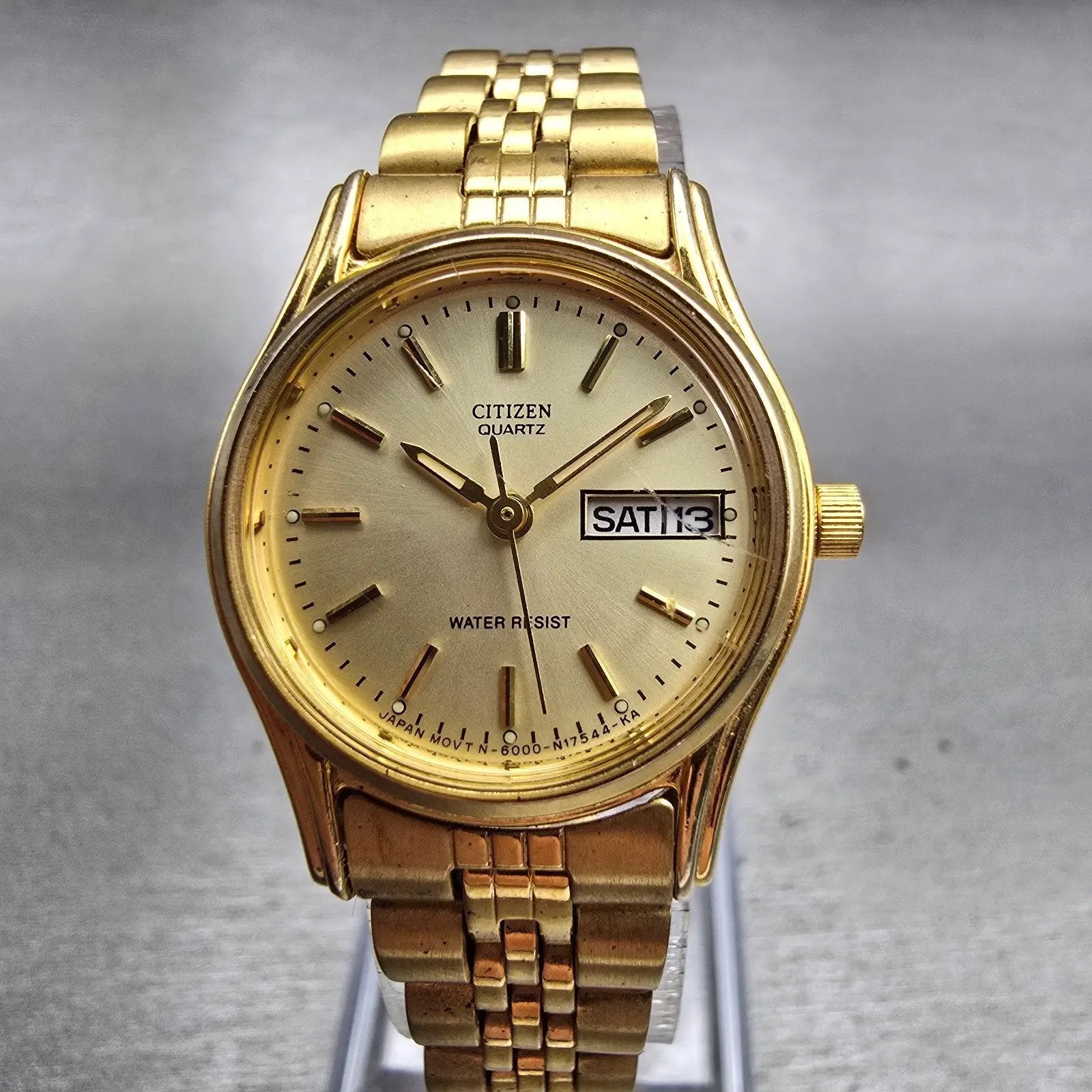 Citizen Watch Women 23mm Champagne Dial Gold Tone Daydate 6000-S38231 New Batt0
