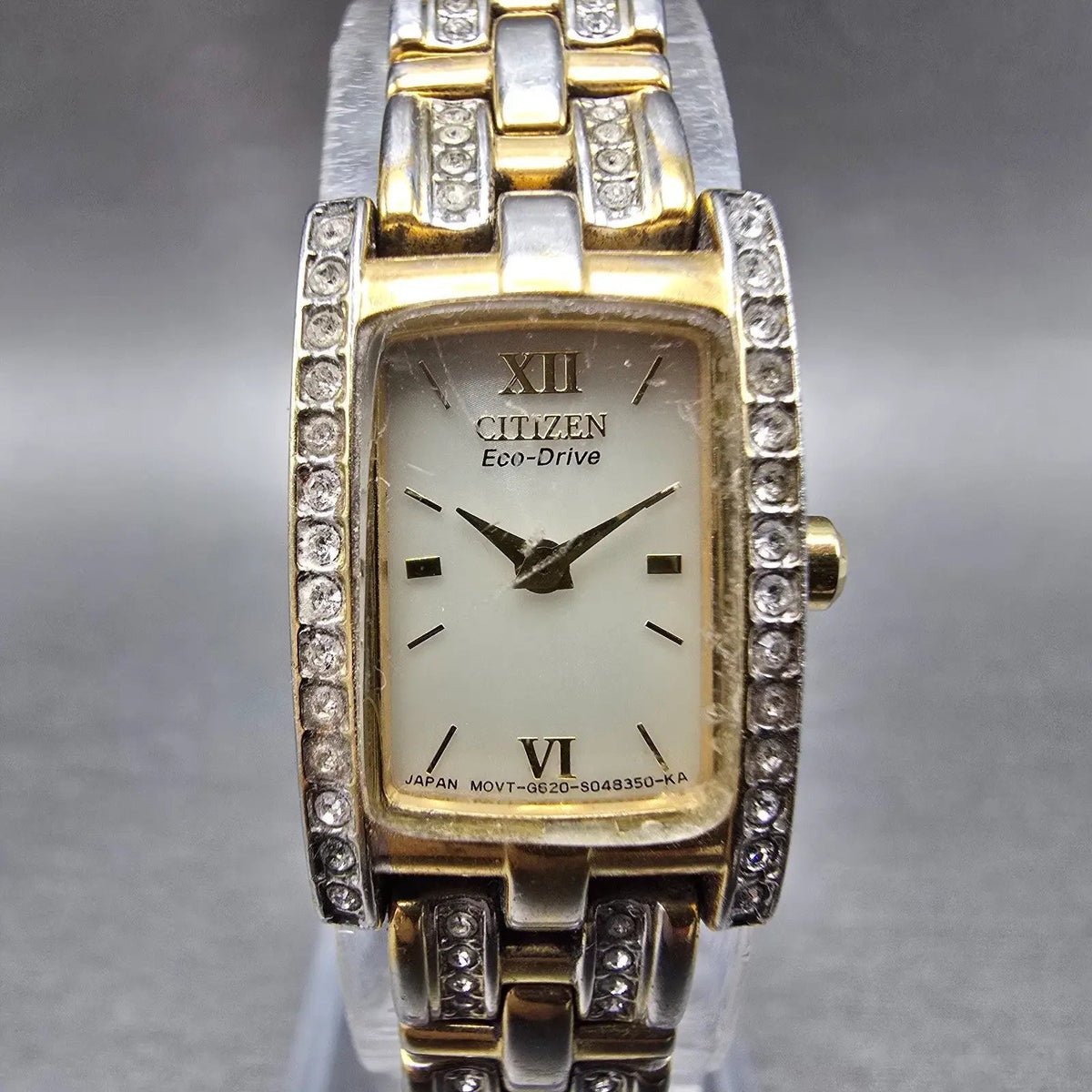 Citizen Eco-Drive Tank Watch Women 15mm White Dial Gold Tone Crystal Bezel Runs0