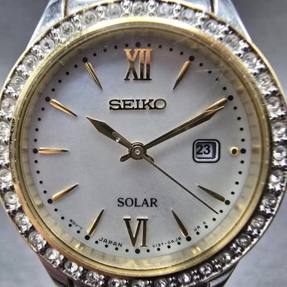 Seiko Solar Watch Women 28mm MOP Dial Two Tone Date Gemmed V137-0AA0 Works JP 951