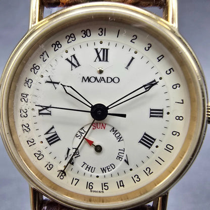 Movado Watch Women 28mm Cream Dial Gold Tone Daydate 87-06-825 New Battery1