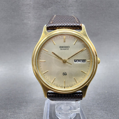 Seiko SQ Watch Men 34mm Champagne Dial Gold Tone Daydate 5Y237030 PARTS0