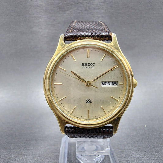 Seiko SQ Watch Men 34mm Champagne Dial Gold Tone Daydate 5Y237030 PARTS0