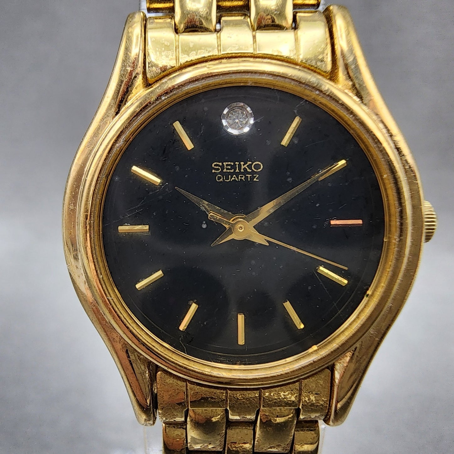 Seiko watch Women 24mm Black Dial Gold Tone Round V4011600 New Battery1
