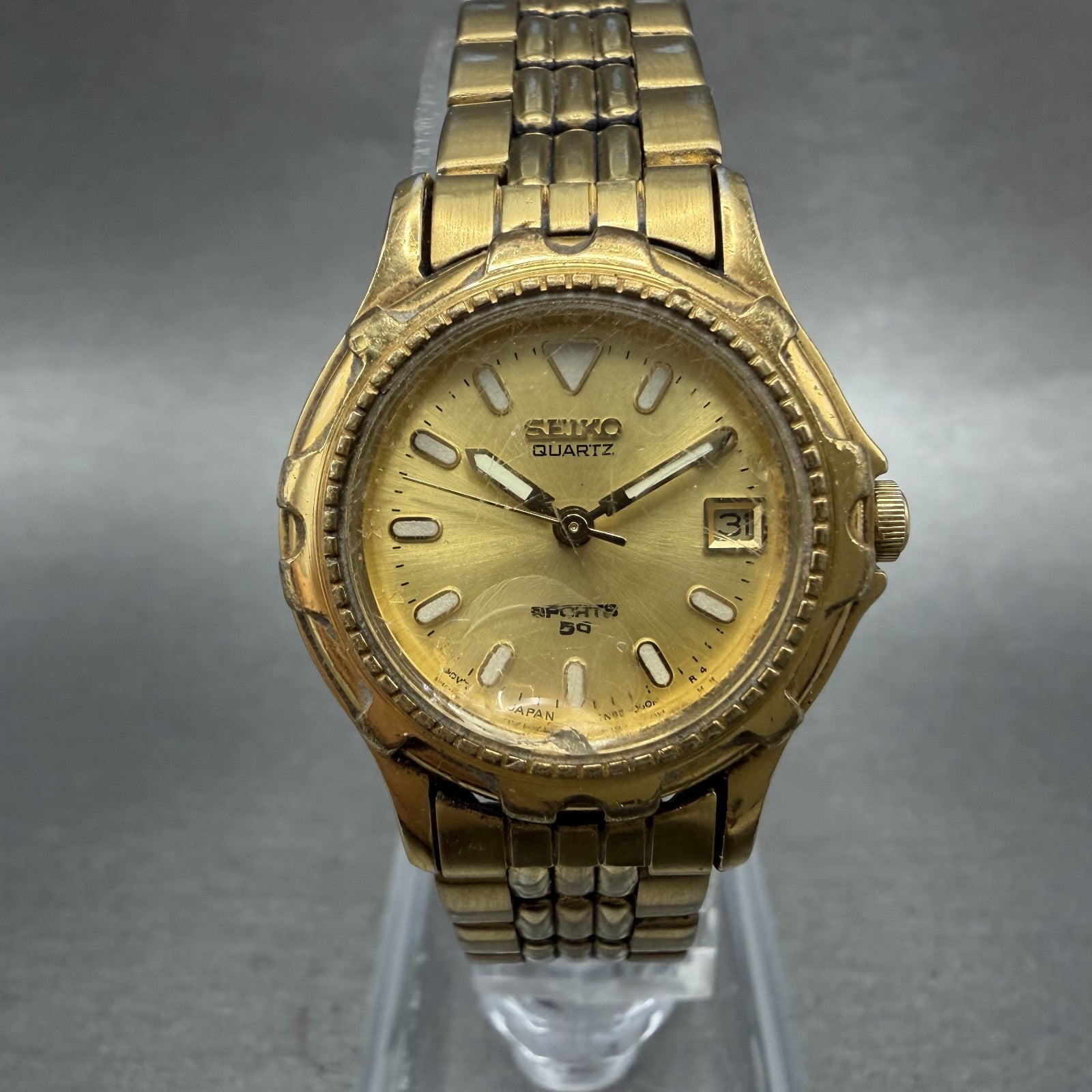 Seiko Sports 50 Watch Women 25mm Champagne Dial Gold Tone Date 7N820271 New Bat0
