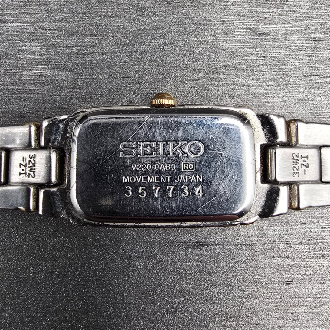 Seiko Watch Women 13mm White Dial Two Tone Rectangle V220-0AB0 New Battery10
