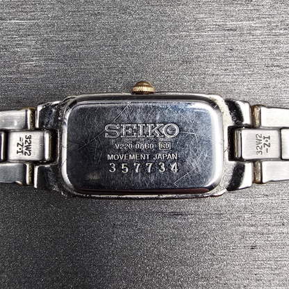 Seiko Watch Women 13mm White Dial Two Tone Rectangle V220-0AB0 New Battery10