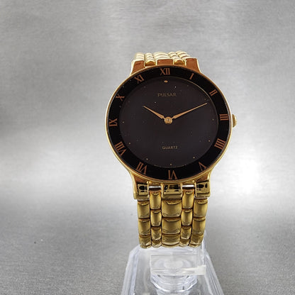 Pulsar Watch Men 32mm Black Dial Gold Tone Round V700-6A30 New Battery