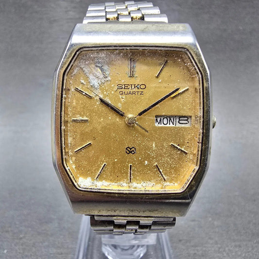 Seiko SQ Watch Men 31mm Gold Dial Gold Tone Daydate Rectangle 8123-5189 PARTS0