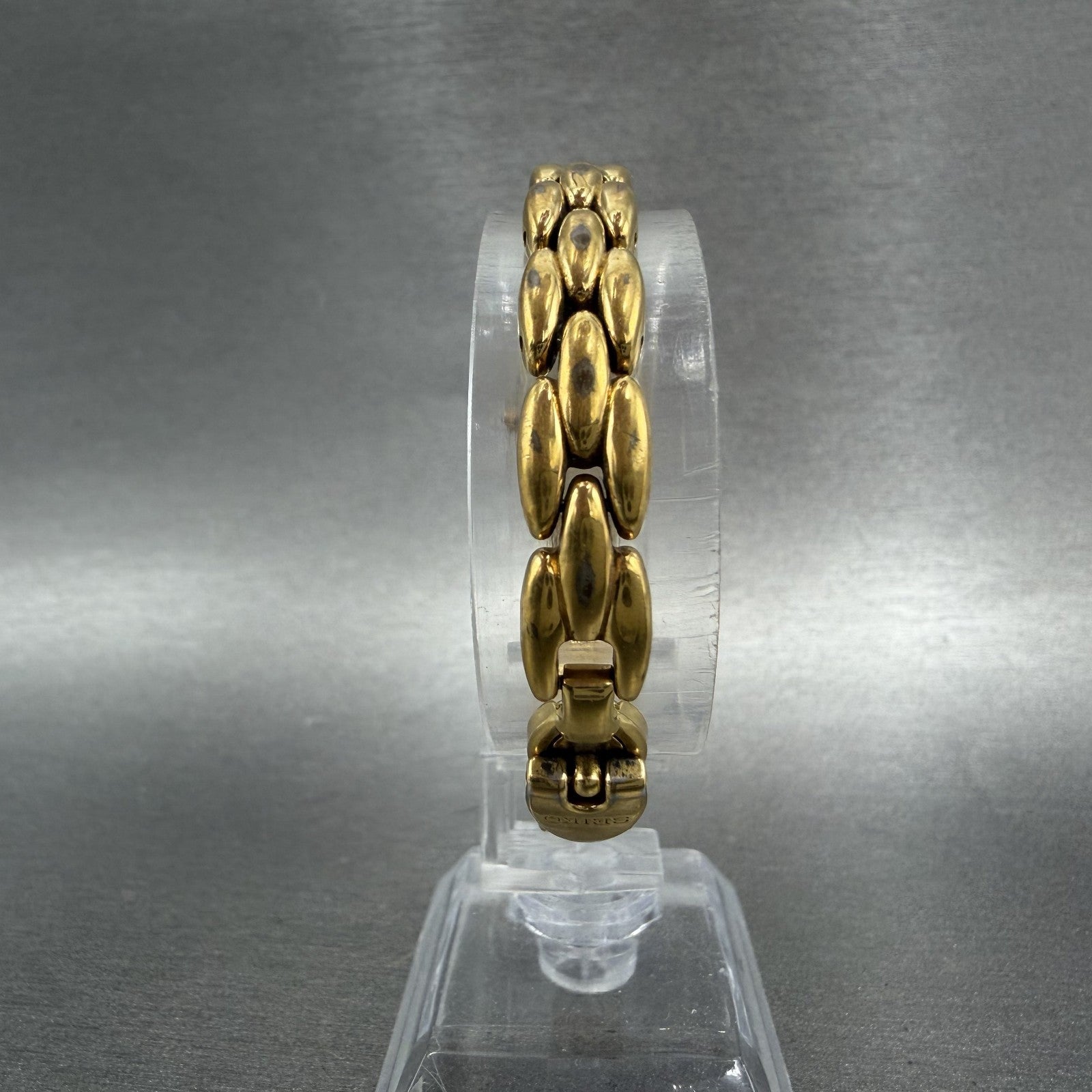 Seiko Watch Women 15mm Silver Dial Gold Tone Oval 2E207203 New Battery7