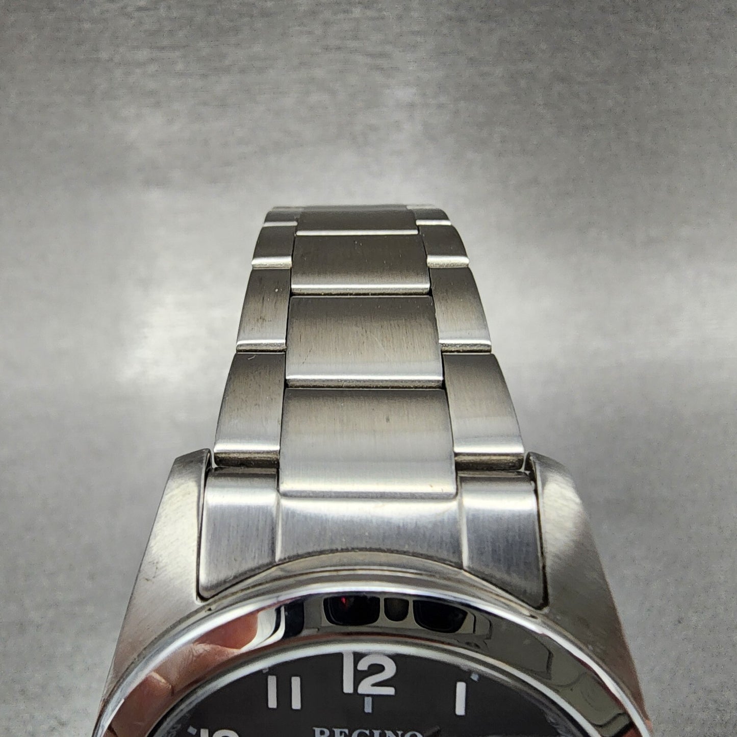 Reguno Watch Men 37mm Black Dial Silver Tone Date Solar H415T017274 Works6