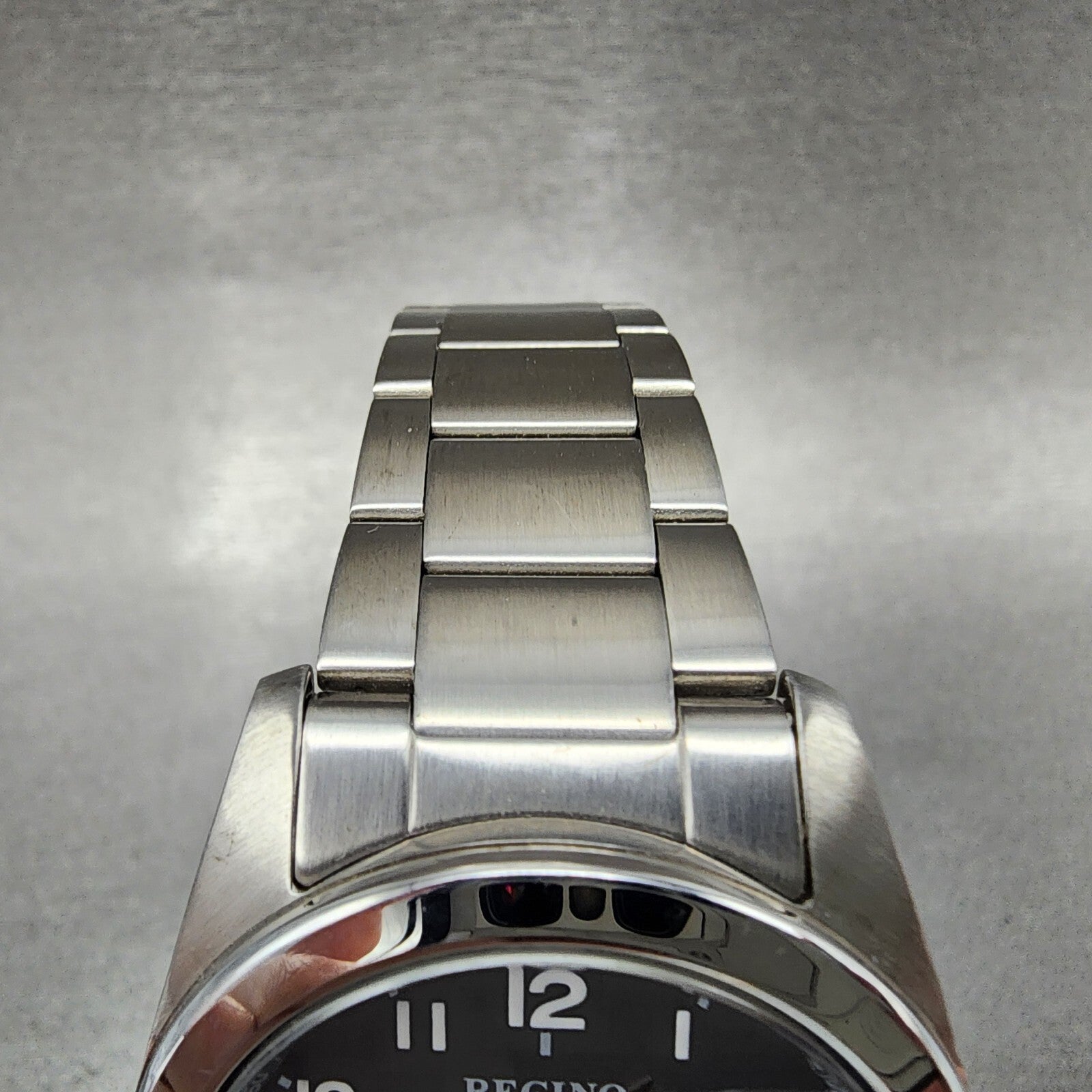 Reguno Watch Men 37mm Black Dial Silver Tone Date Solar H415T017274 Works6
