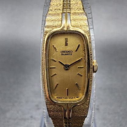 Seiko Tank Watch Women 13mm Gold Dial Gold Tone Rectangle 2E206310 New BatteryA1