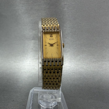 Seiko Tank Watch Women 13mm Champagne Dial Gold Tone 2E20-6700 New Battery5