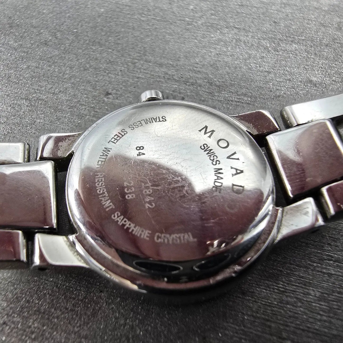 Movado Amorosa Watch Women 24m Black Dial Silver Tone Round 84 E4 1842 NewBat MW9