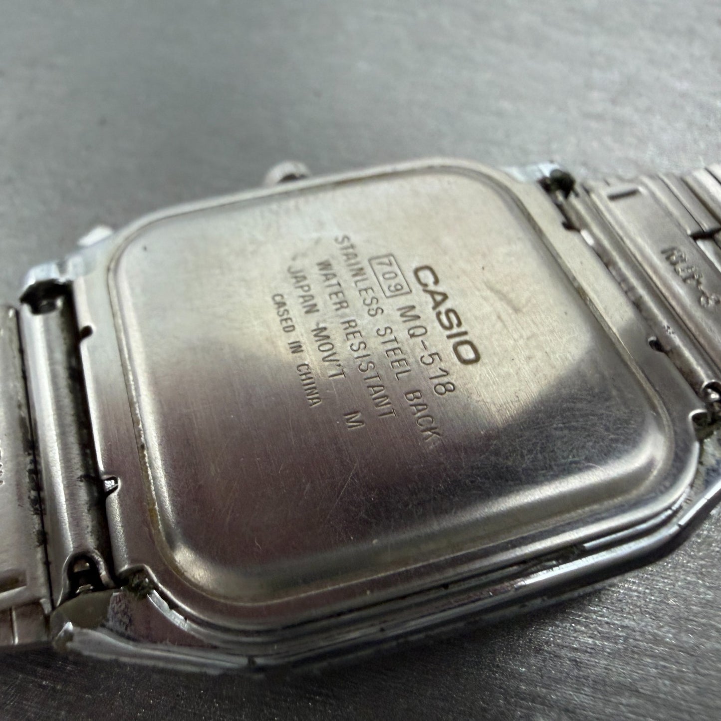 Casio MQ-518 Watch Men 30mm Silver Dial Silver Tone Rectangle Daydate New Batt9