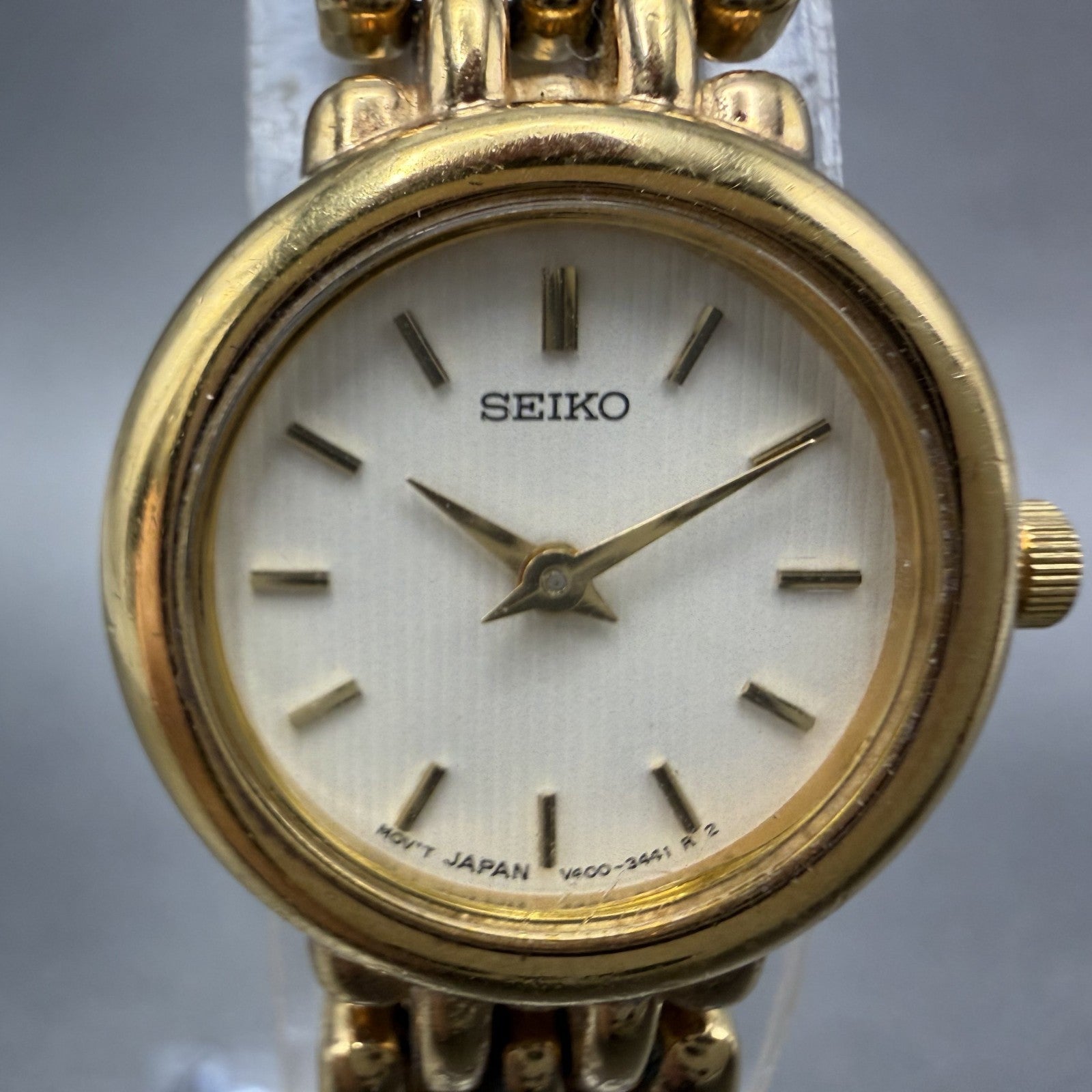 Seiko Watch Women 20mm White Dial Gold Tone Round V400-0990 New Battery ABC1