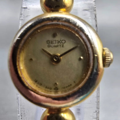 Seiko Watch Women 14mm Champagne Dial Gold Tone Round 1E20-0079 New Battery VTG1