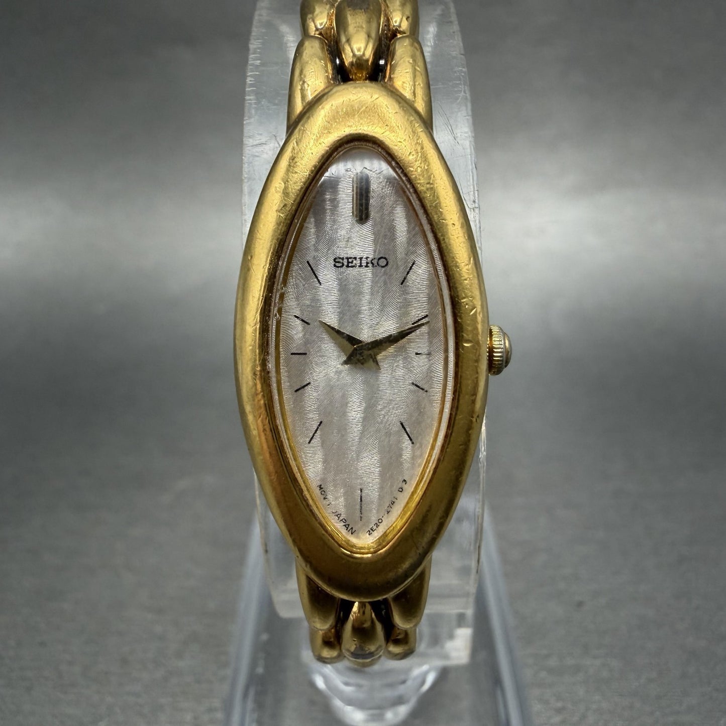 Seiko Watch Women 15mm Silver Dial Gold Tone Oval 2E207203 New Battery0