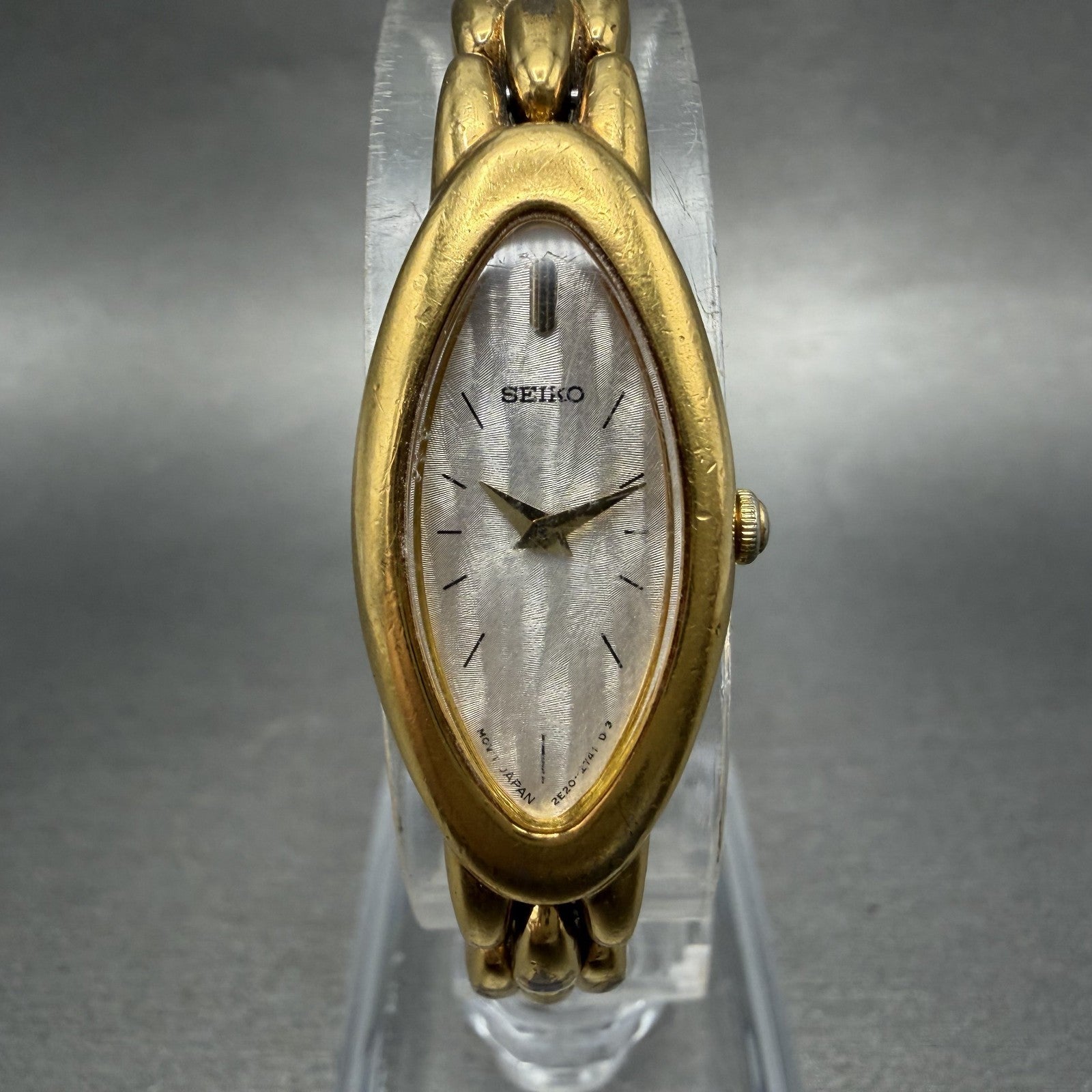 Seiko Watch Women 15mm Silver Dial Gold Tone Oval 2E207203 New Battery0
