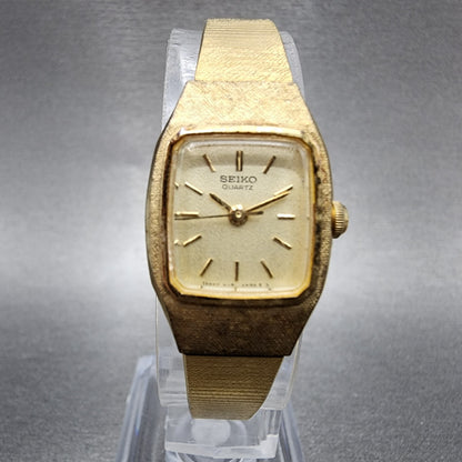 VTG Seiko Watch Women 17mm Champagne Dial Gold Tone Rectangle 54215029 New Batt0