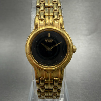 Seiko Watch Women 19mm Black Dial gold Tone Round V400-0538 New Battery Vintage0