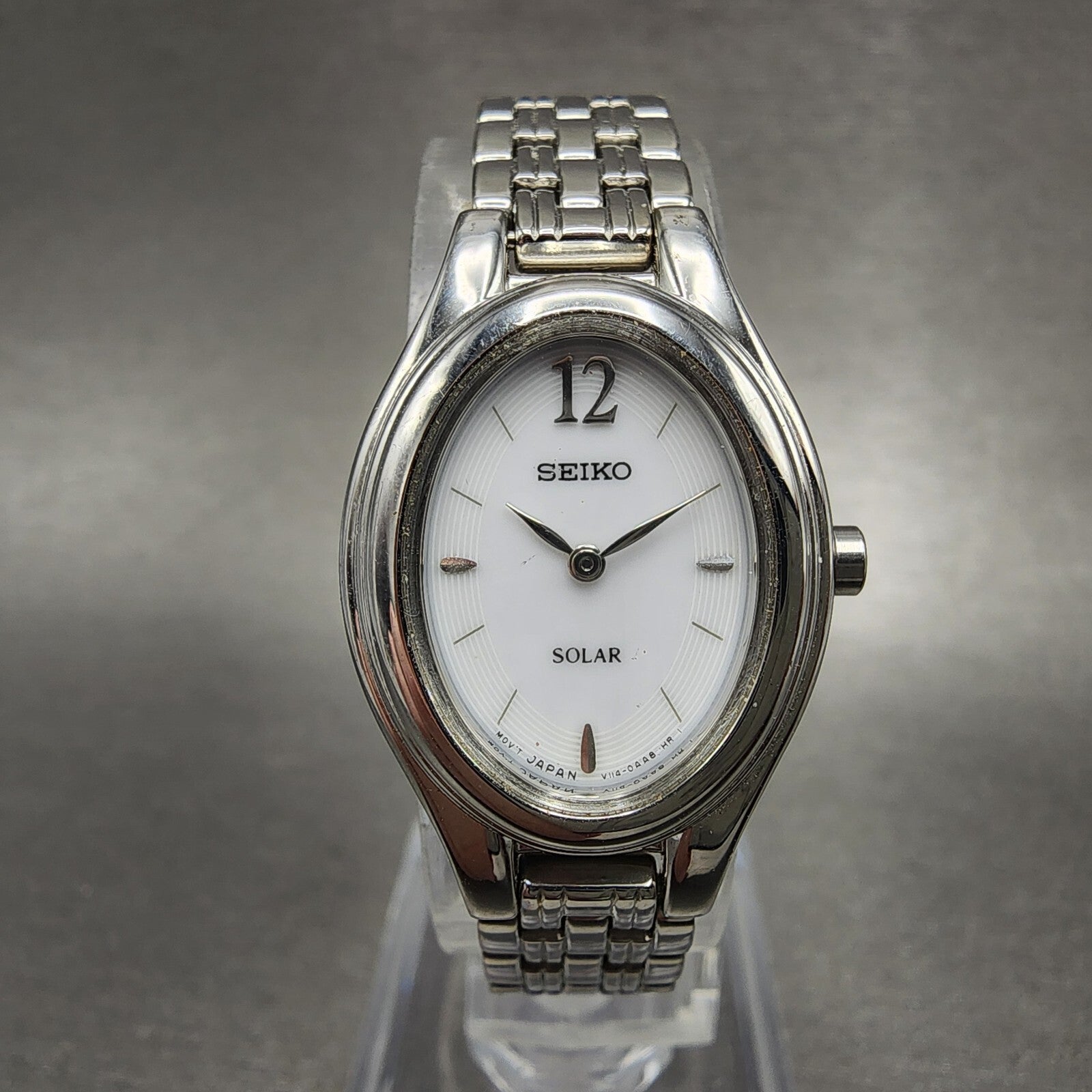 Seiko Solar Watch Women 20mm White Dial Steel Oval V1140AA0 PARTS0