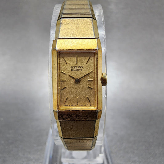 Seiko Tank Watch Women 12mm Champagne Dial Gold Tone 2e205029 New Battery0