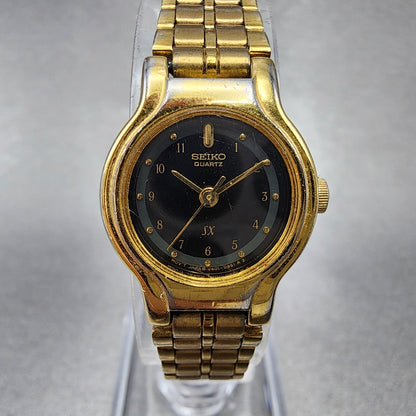 VTG Seiko SX Watch Women 19mm Black Dial Gold Tone Round V4010281 New Battery0