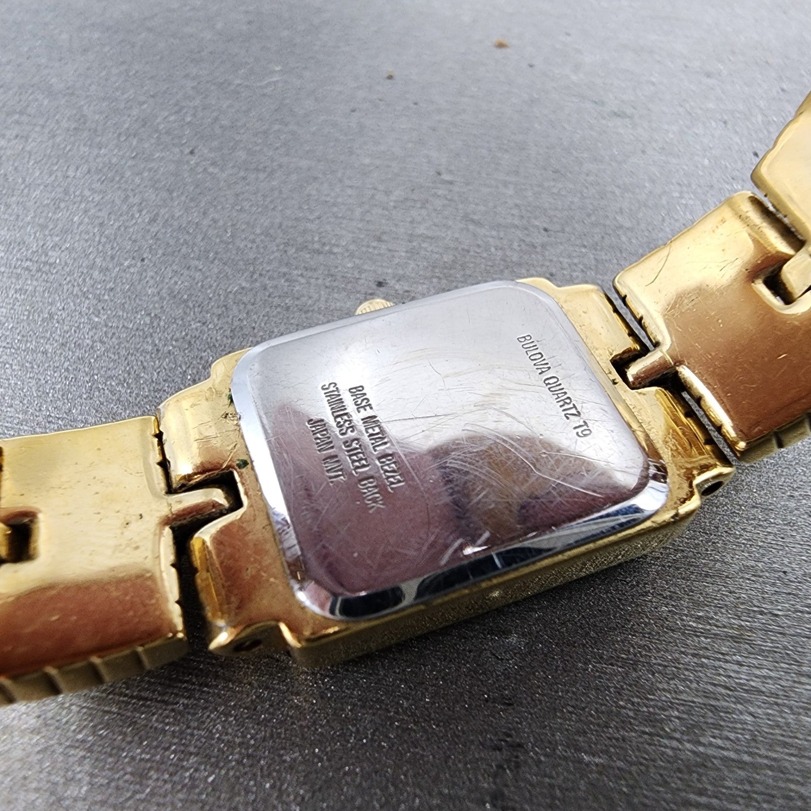 Bulova Tank Watch Women 16mm White Dial Gold Tone Rectangle 97S42 New Battery9