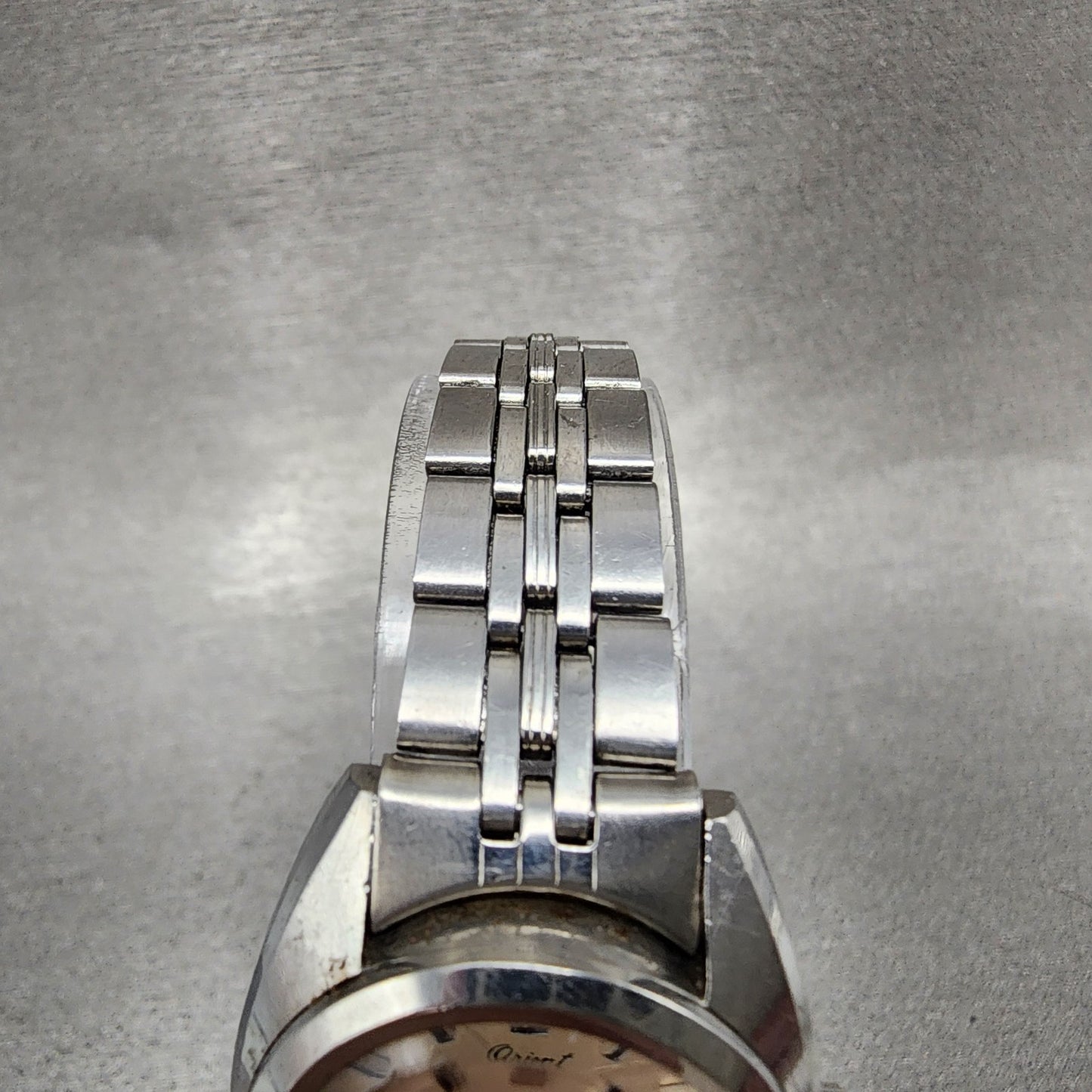 Orient Lausanne Watch Women 25mm Silver Dial Steel Date Round Runs 4133040004