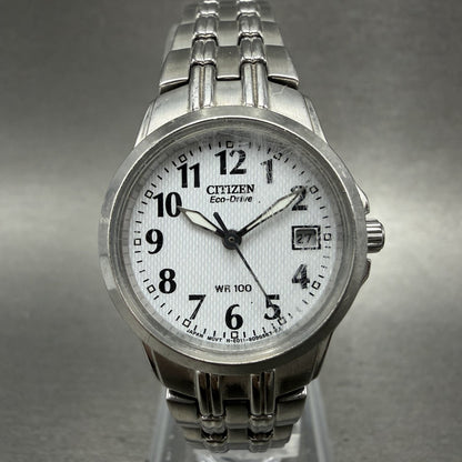 Citizen EcoDrive Watch Women 25mm White Dial Silver Tone Date E011S06489 Runs0