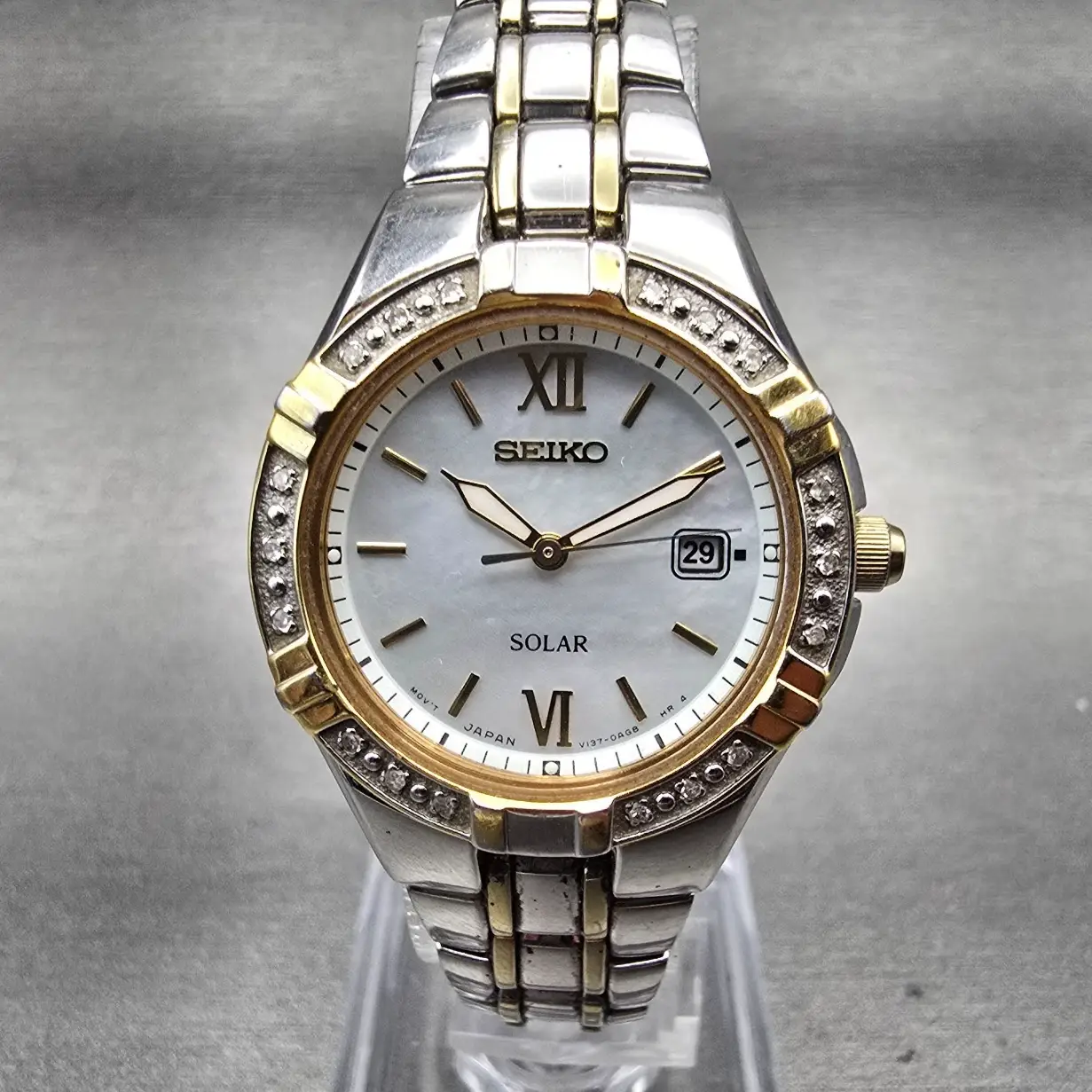 Seiko Solar Watch Women 28mm MOP Dial Two Tone Date Gemmed Round V137-0AD0 Works0
